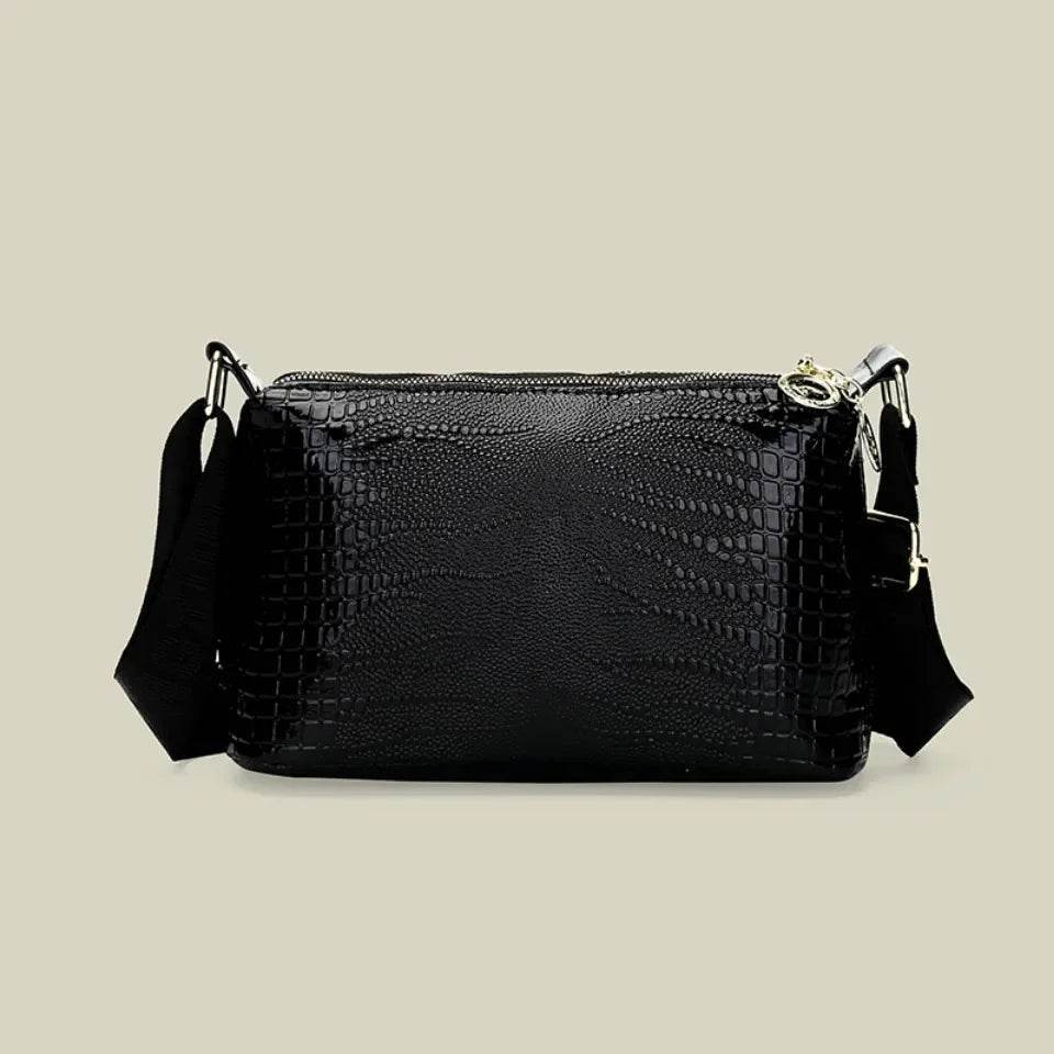 Patent Leaer Serpentine Crossbody Bag - AngraBech