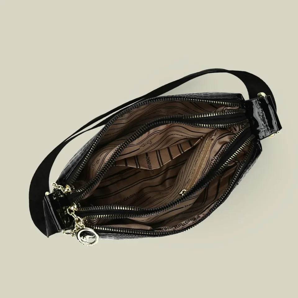 Patent Leaer Serpentine Crossbody Bag - AngraBech