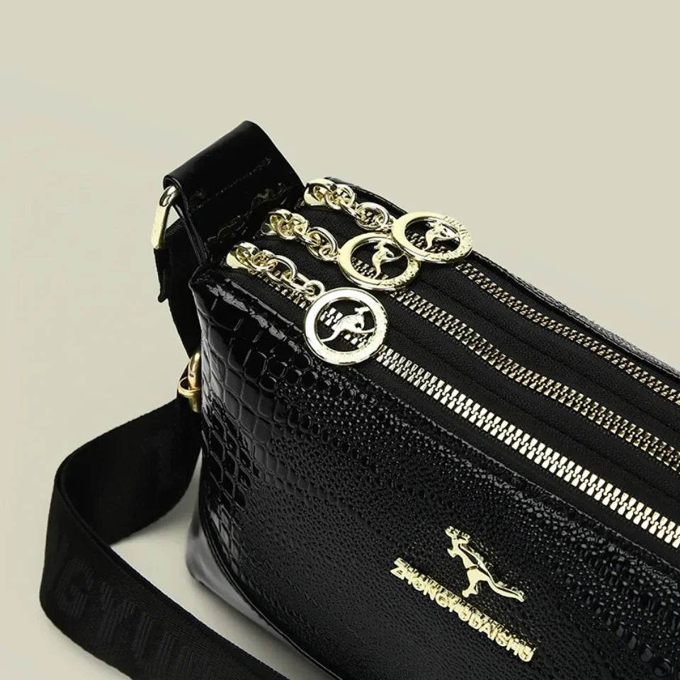 Patent Leaer Serpentine Crossbody Bag - AngraBech